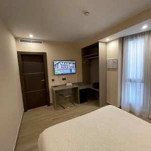 Kamer met een Queen Size Bed